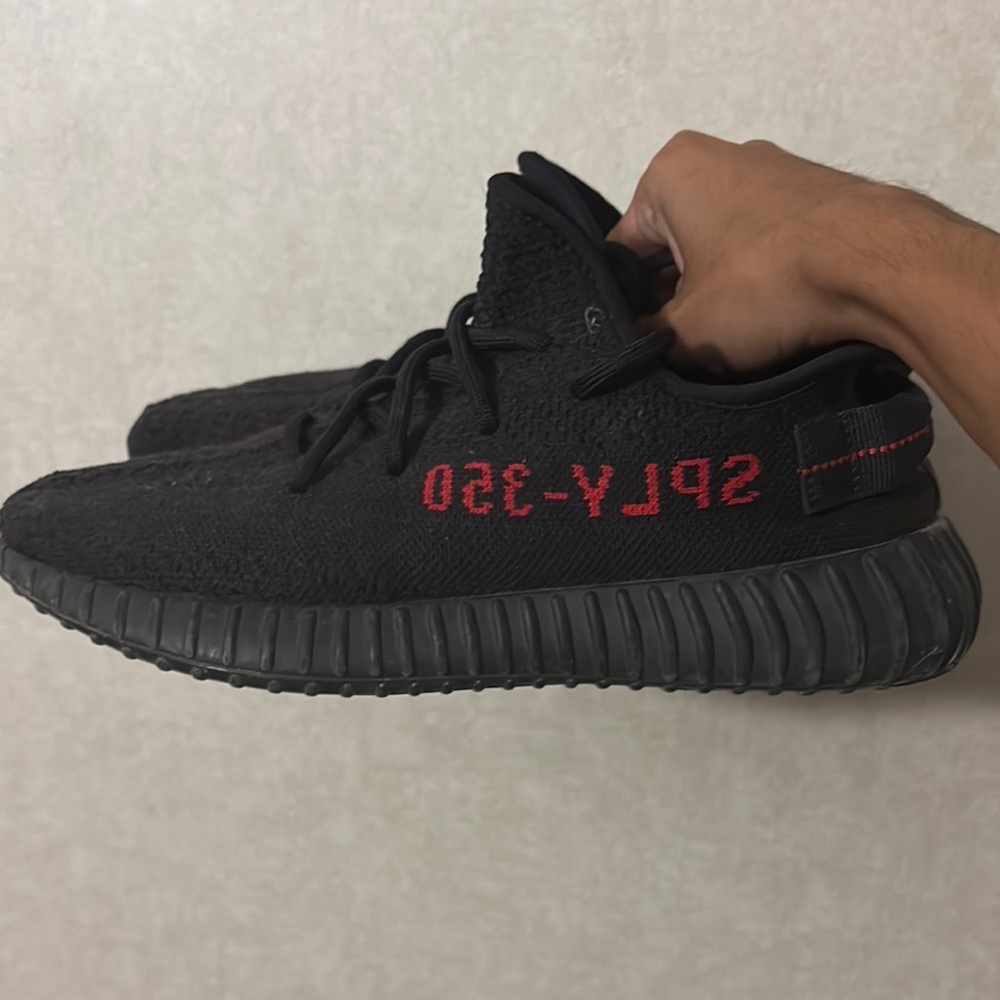 Adidas Black Red Sneakers with Primeknit Upper and Boost Cushioning